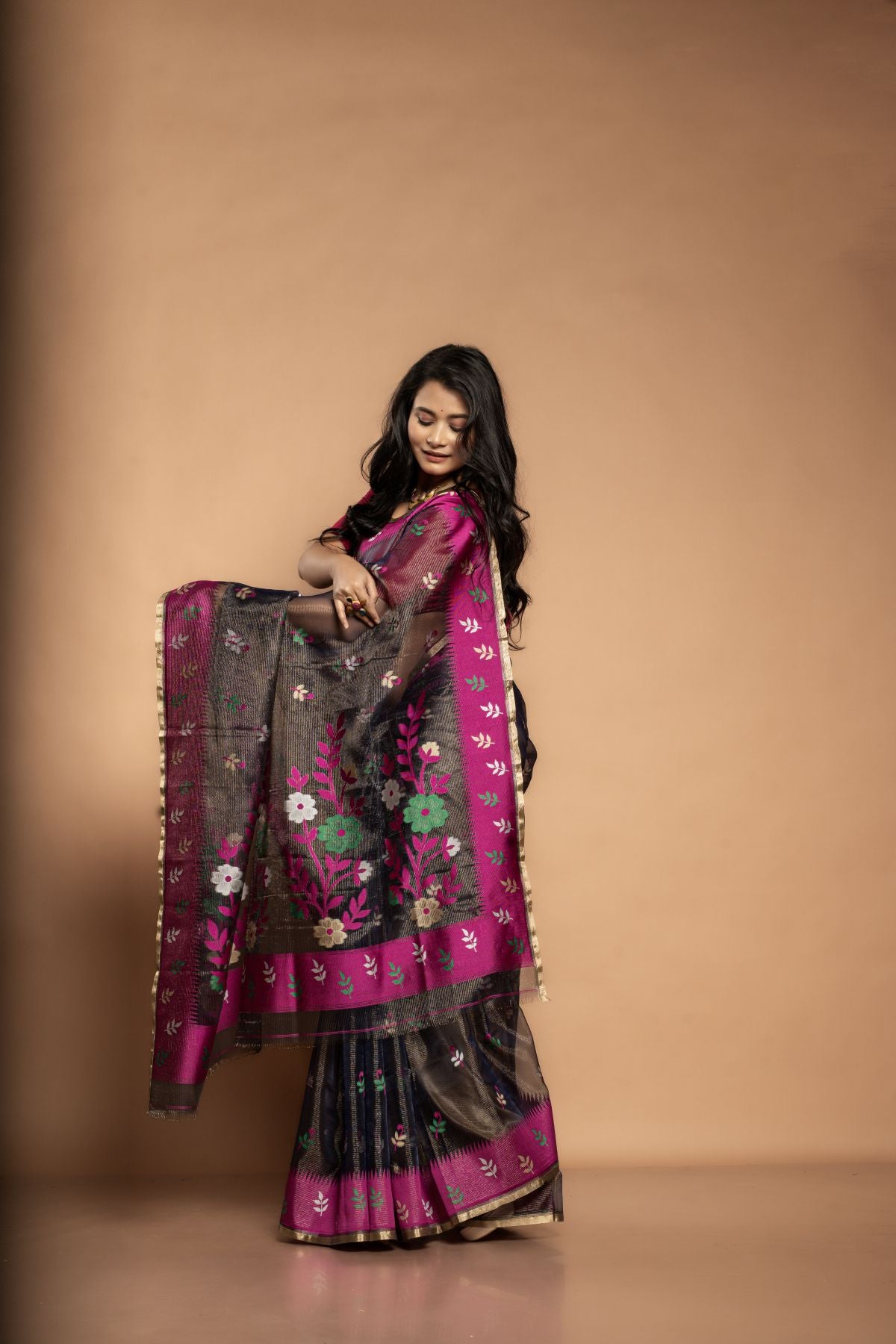 Kalpana | Pure Muslin Tissue Saree with Floral Rani Pink Border in Black